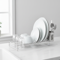 Modern stainless steel dish drying rack on kitchen counter